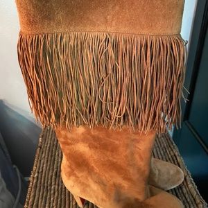 Knee high suede fringe moccasin boot